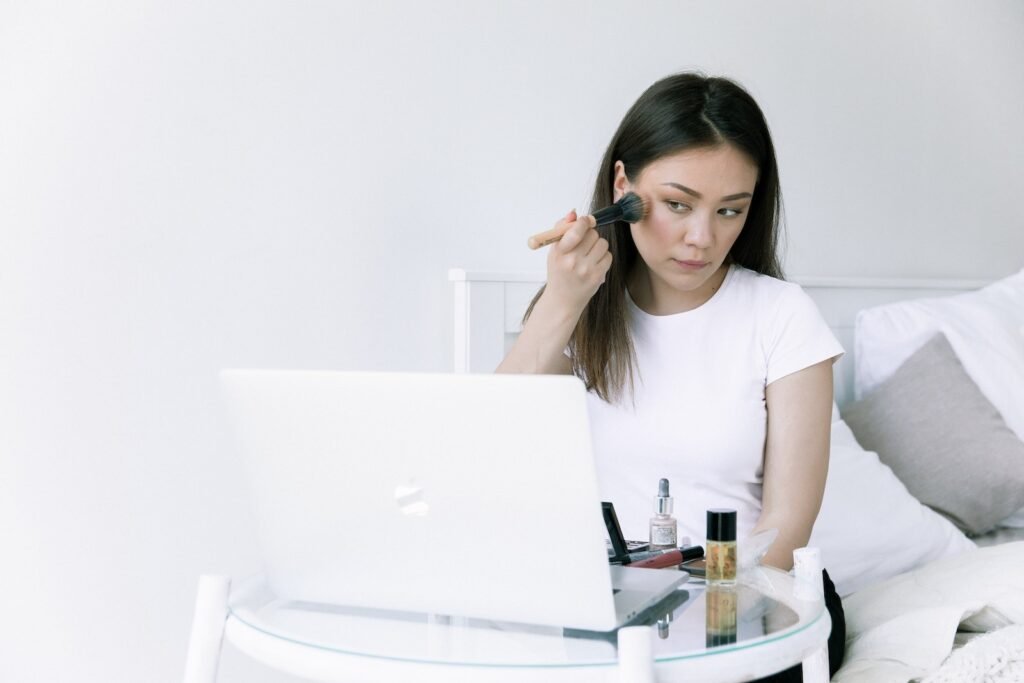 Woman Looking On Laptop