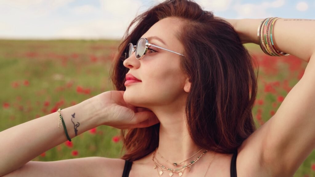 Woman in different poses in the poppy field