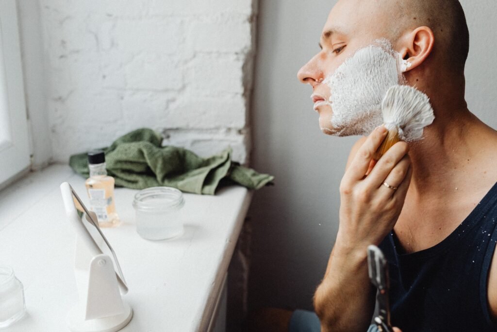 Man Shaving Himself