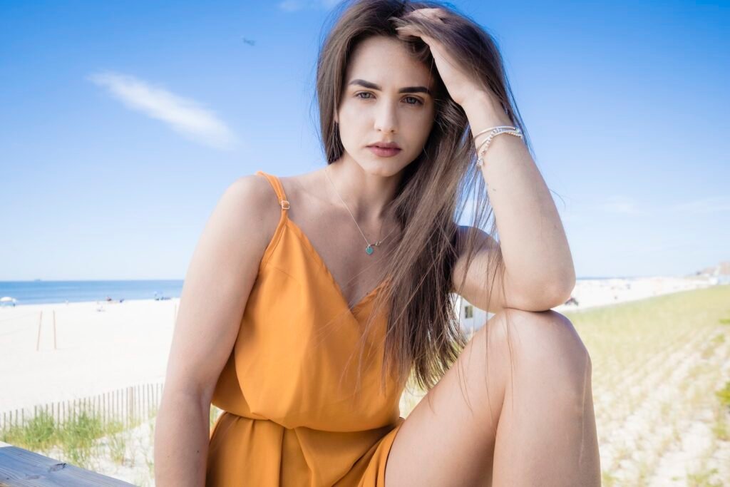 Portrait of Beautiful Woman Posing on Beach