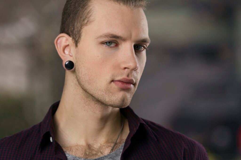 Man Wearing Maroon Collared Shirt