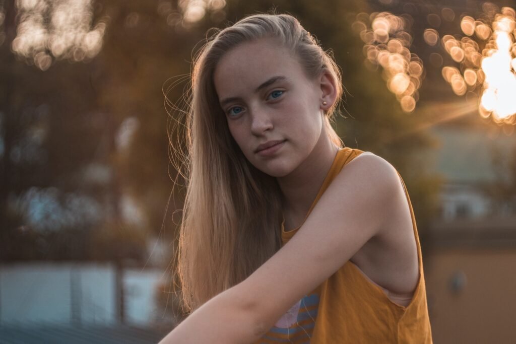 A Young Woman in Yellow Tank Top