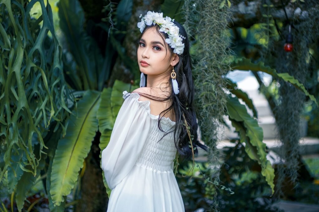 Beautiful Asian Girl in White Dress and Flower Crown