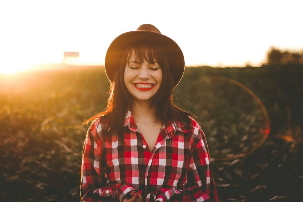 woman in red and white checkered dress shirt